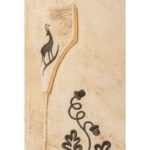 Floral embroidered light Bavarian lederhosen shorts, side view of traditional German attire