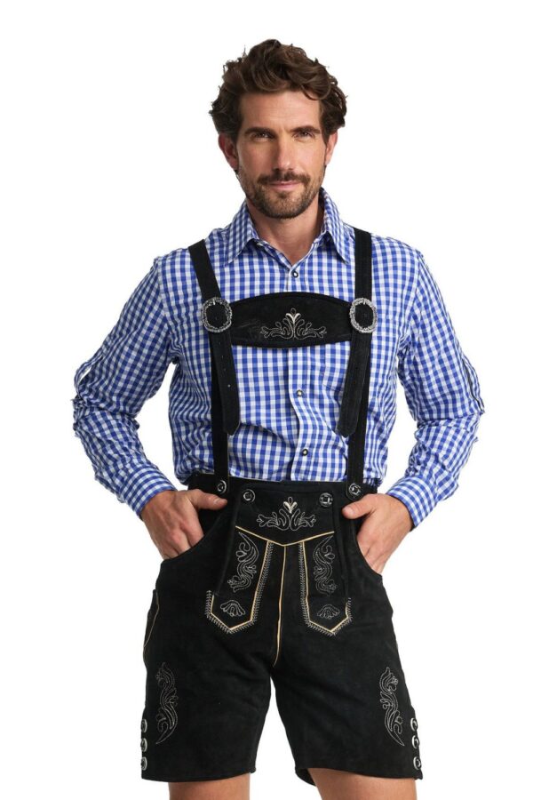 Man wearing authentic black lederhosen with traditional Bavarian embroidery