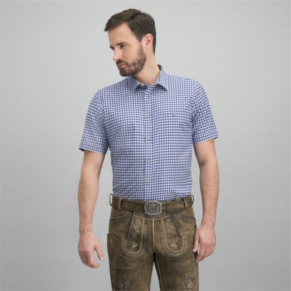 Man wearing Bavarian short sleeve shirt in blue gingham