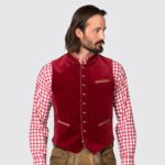 Man wearing traditional German vest in deep red, zoomed