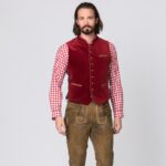 Man wearing traditional German vest in deep red
