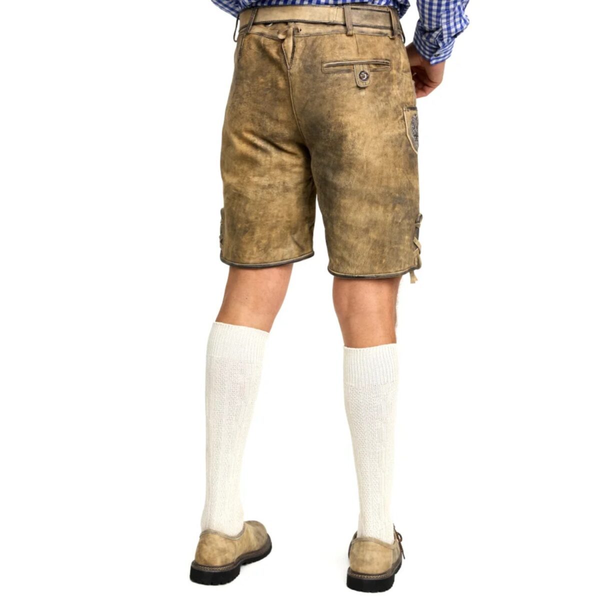 Back View of man wearing of handcrafted German lederhosen in mountain beige
