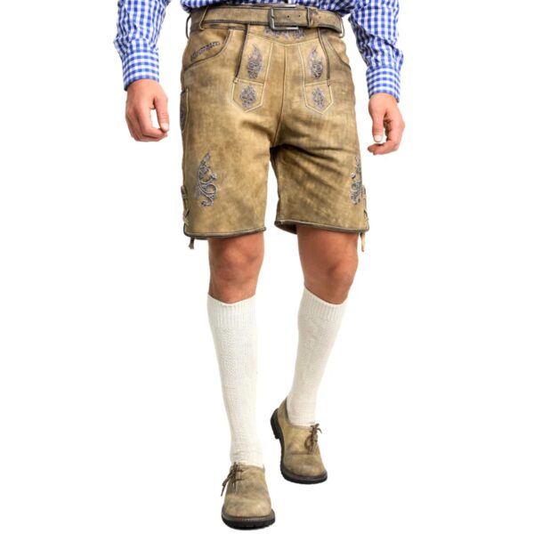 Front View of man wearing of handcrafted German lederhosen in mountain beige
