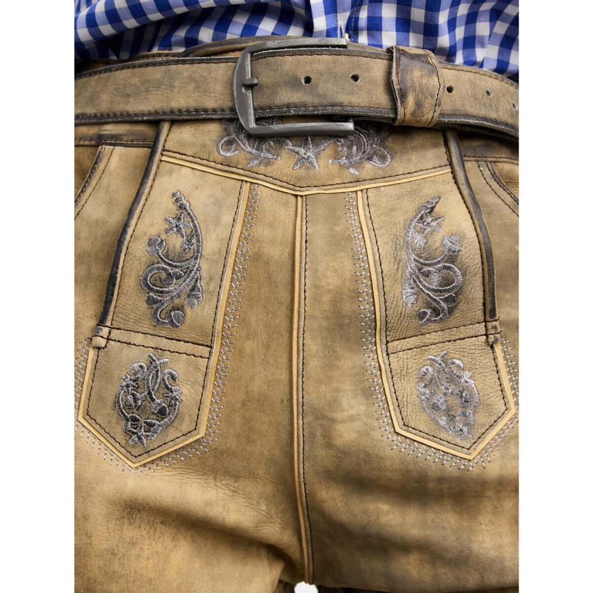 Front embroidery of handcrafted German lederhosen in mountain beige