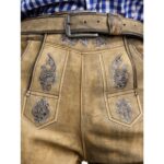 Front embroidery of handcrafted German lederhosen in mountain beige